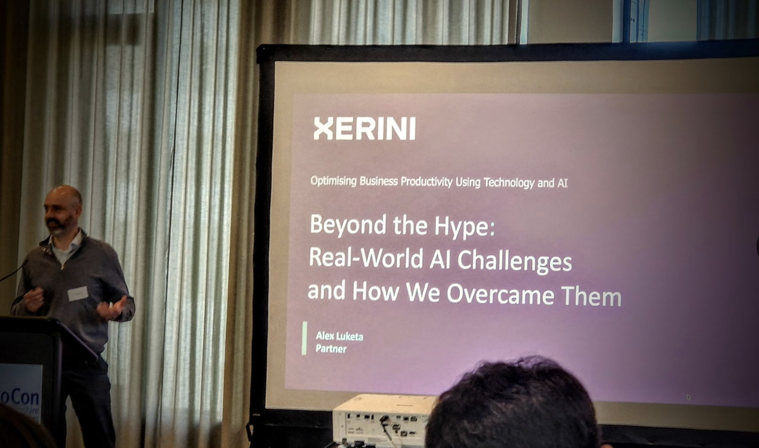 Alex presenting at conference