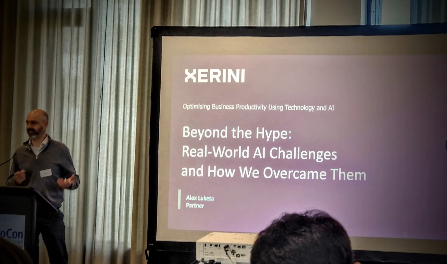 Alex presenting at conference